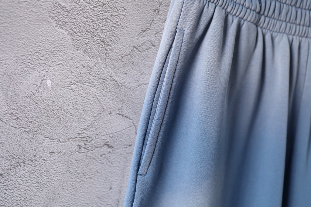 Light blue pants with drawstring at side seam