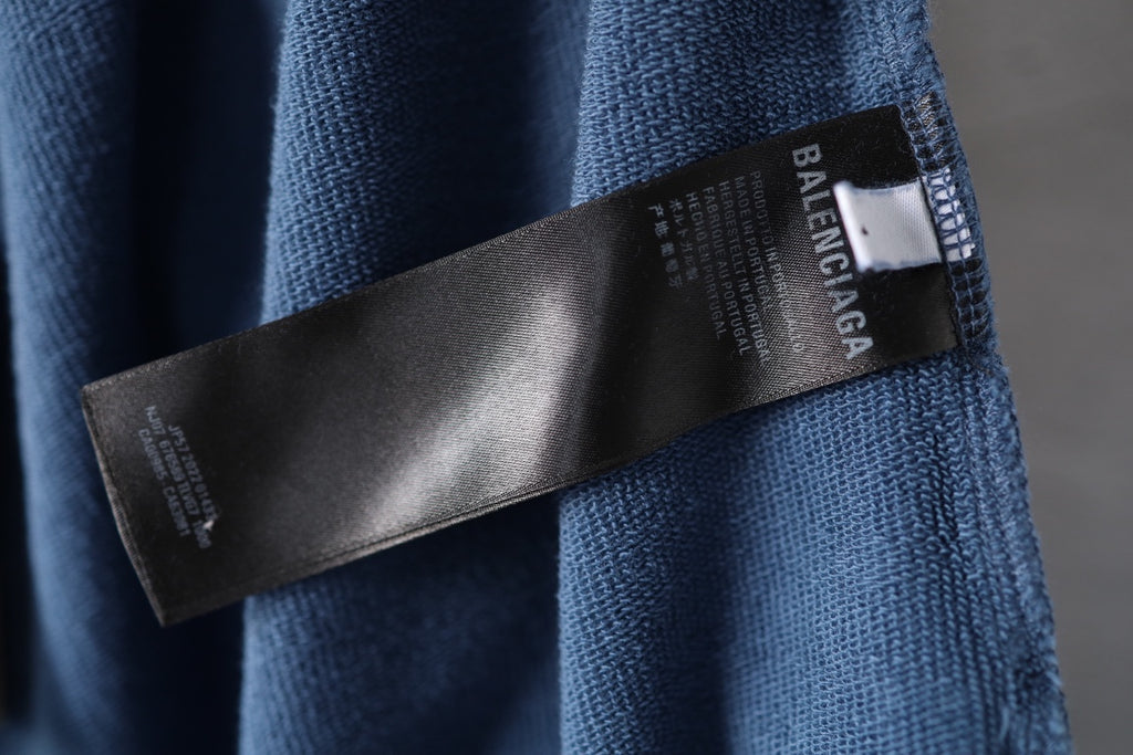 Blue waistband fabric with Balenciaga label stitched on
