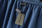 Blue pants with Balenciaga tag and hanging label