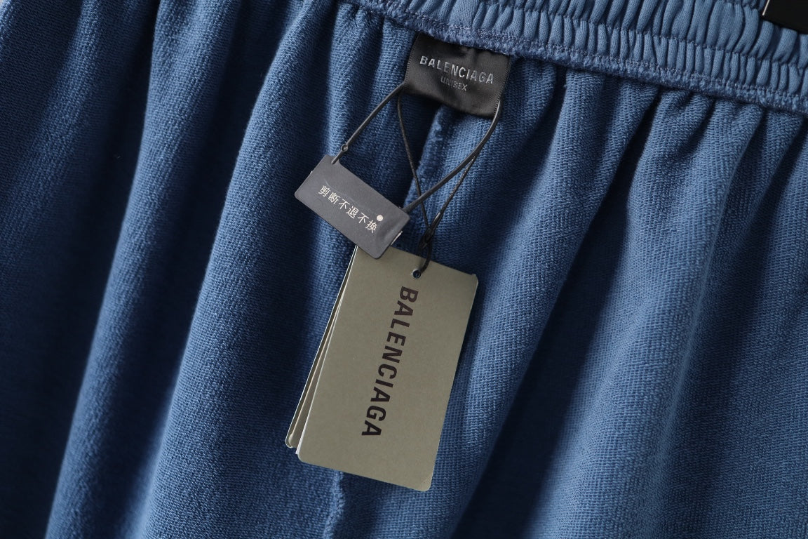 Blue pants with Balenciaga tag and hanging label