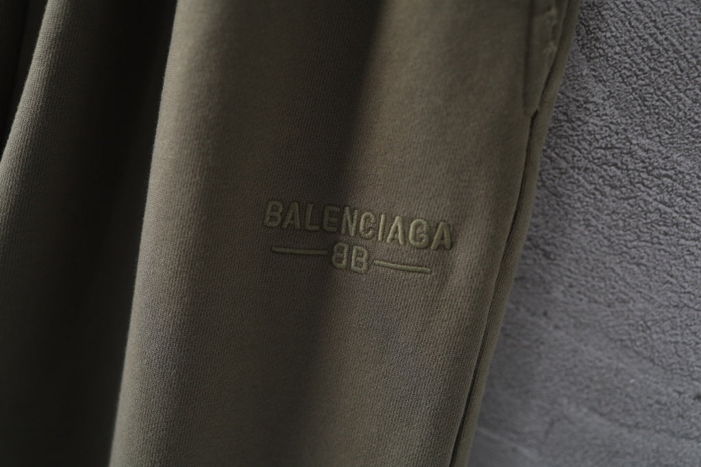 Balenciaga logo print on olive green pants leg
