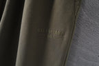 Balenciaga logo print on olive green pants leg