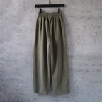 Olive green pants with elastic waistband and relaxed wide legs
