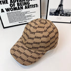 Tan baseball cap with dark allover chain-link pattern, curved brim, angled view