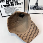Tan baseball cap interior view with beige lining and curved brim from side