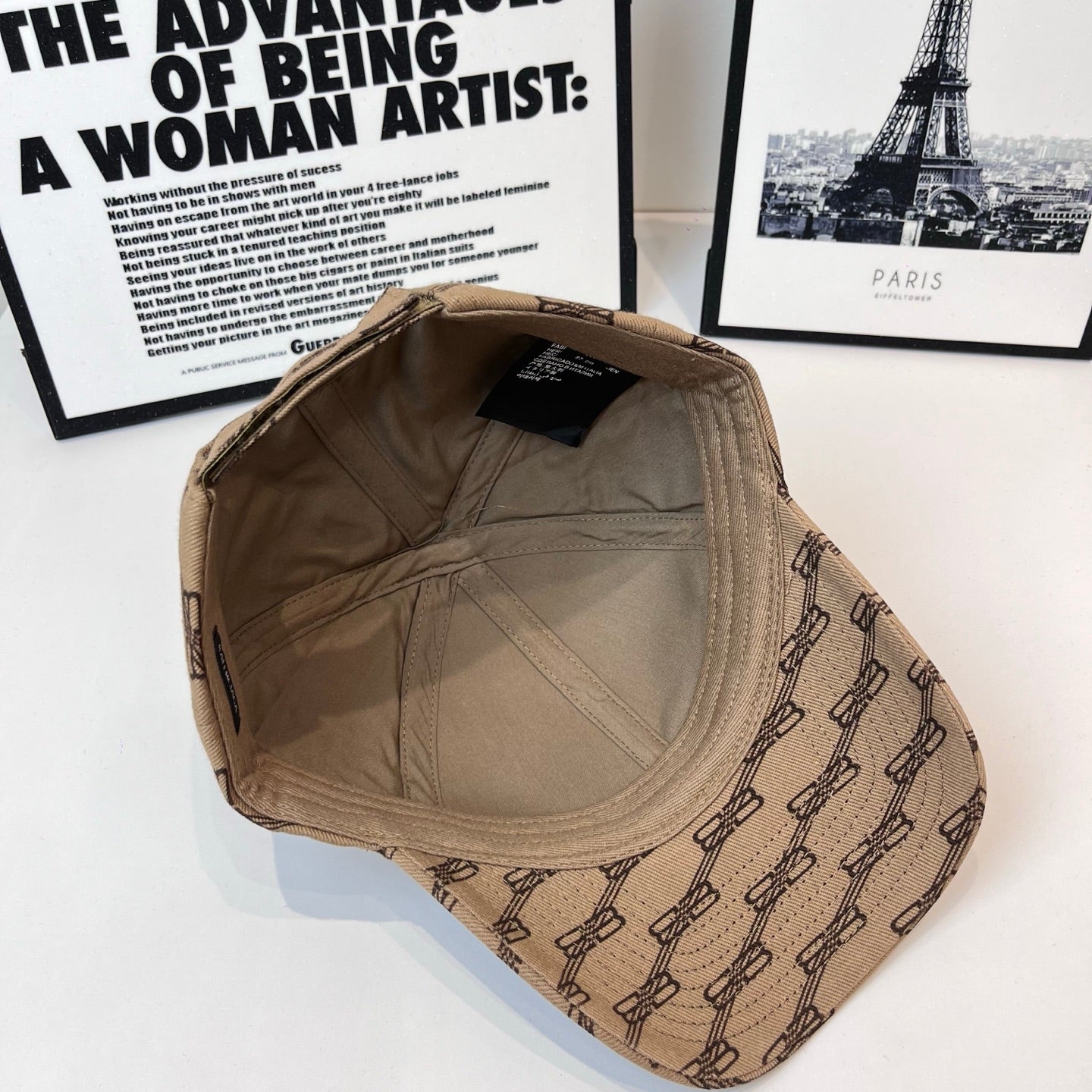 Beige baseball cap interior and underside view, chain-pattern side panels