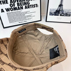 Tan baseball cap inside shows beige lining and black brand label on side