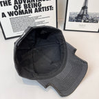 Balenciaga cap in dark gray showing back vents and embroidered side logo