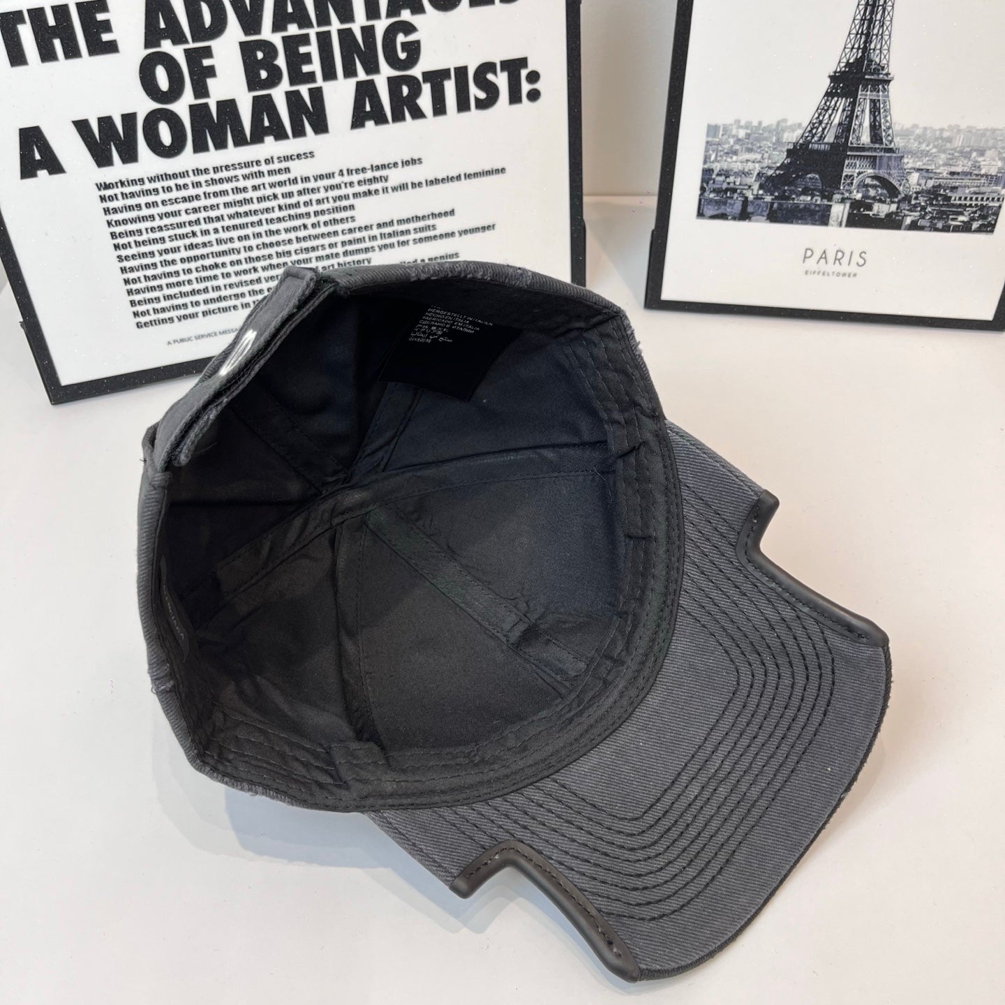 Balenciaga cap in dark gray showing back vents and embroidered side logo