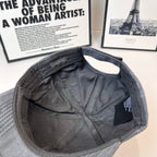 Balenciaga cap interior in dark gray with inner tag and stitched panels