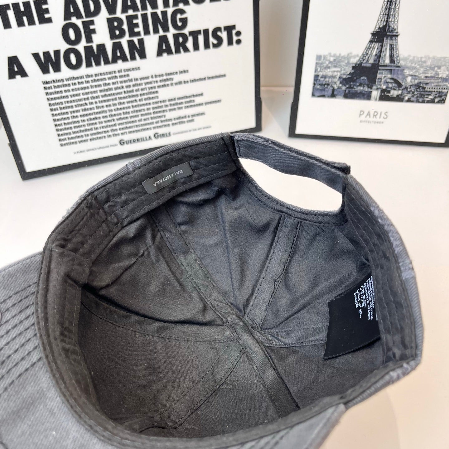 Balenciaga cap interior in dark gray with inner tag and stitched panels