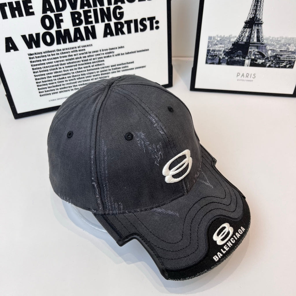 Burberry cap in dark gray with white oval emblem and curved brim