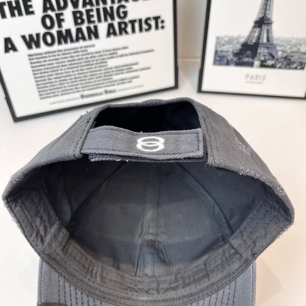 Burberry cap interior in dark gray with stitched lining and inner emblem