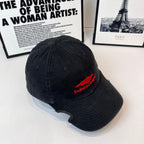 Black denim baseball cap with Balenciaga red logo on side