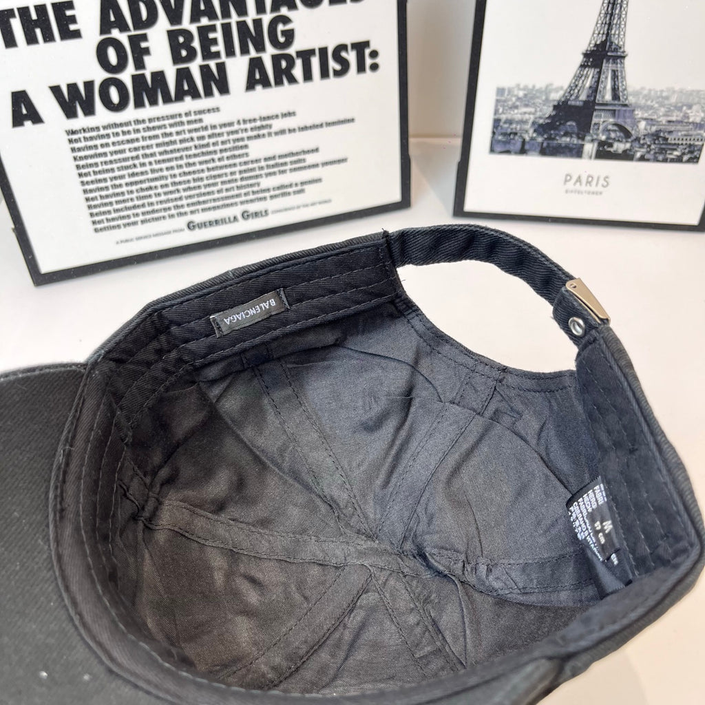 Balenciaga cap interior with inner tag patch and adjustable strap hardware on top edge