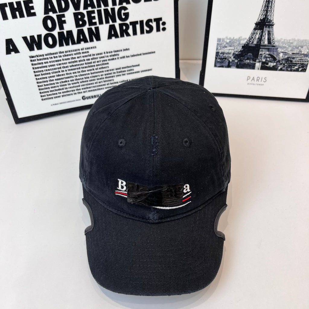 Balenciaga cap, dark fabric, embroidered logo patch on front