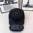 Burberry baseball cap in dark denim with distressed embroidered lettering on front