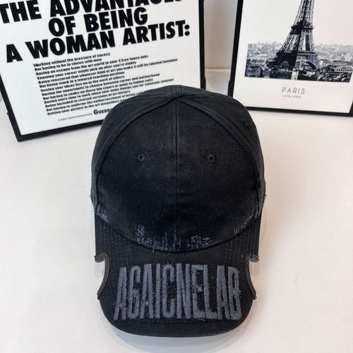 Burberry baseball cap in dark denim with distressed embroidered lettering on front