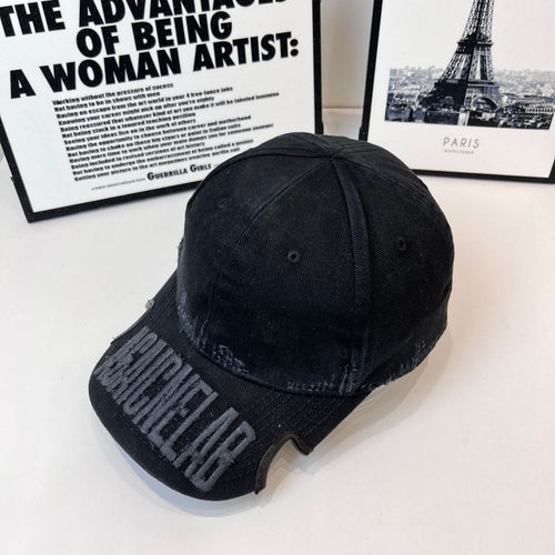 Black Balenciaga cap with curved brim and side BALENCIAGA embroidered text