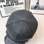 Black Balenciaga cap back view with curved brim and BALENCIAGA embroidery