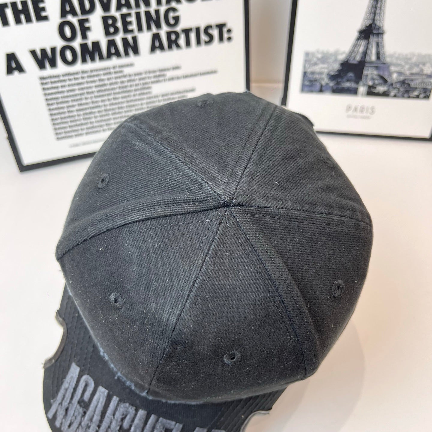 Black Balenciaga cap back view with curved brim and BALENCIAGA embroidery