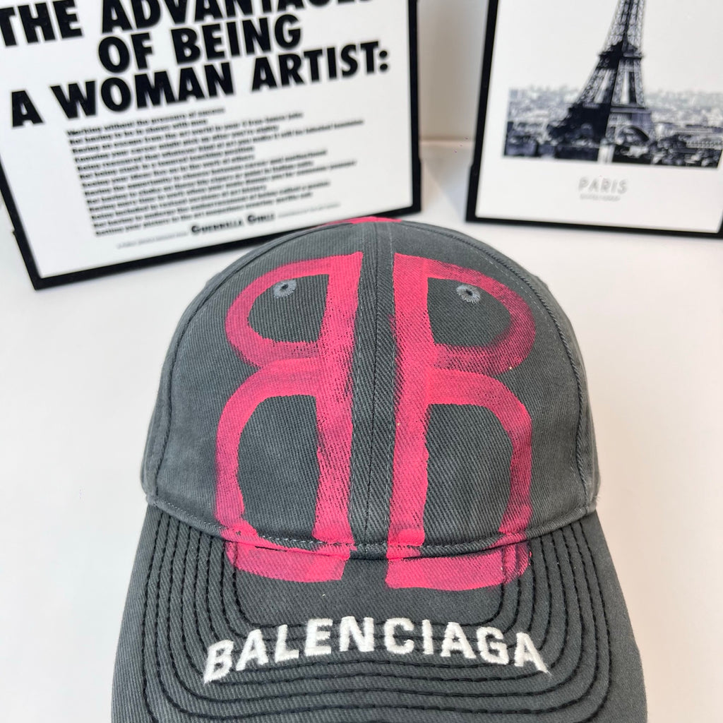 Baseball cap, dark gray with pink B graphic on crown