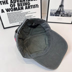 Baseball cap interior view, dark gray lining and stitched seams