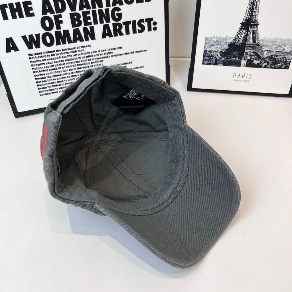 Balenciaga dark gray cap interior view showing lining and seam details