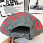 Balenciaga dark gray cap with red lettering and interior seam view