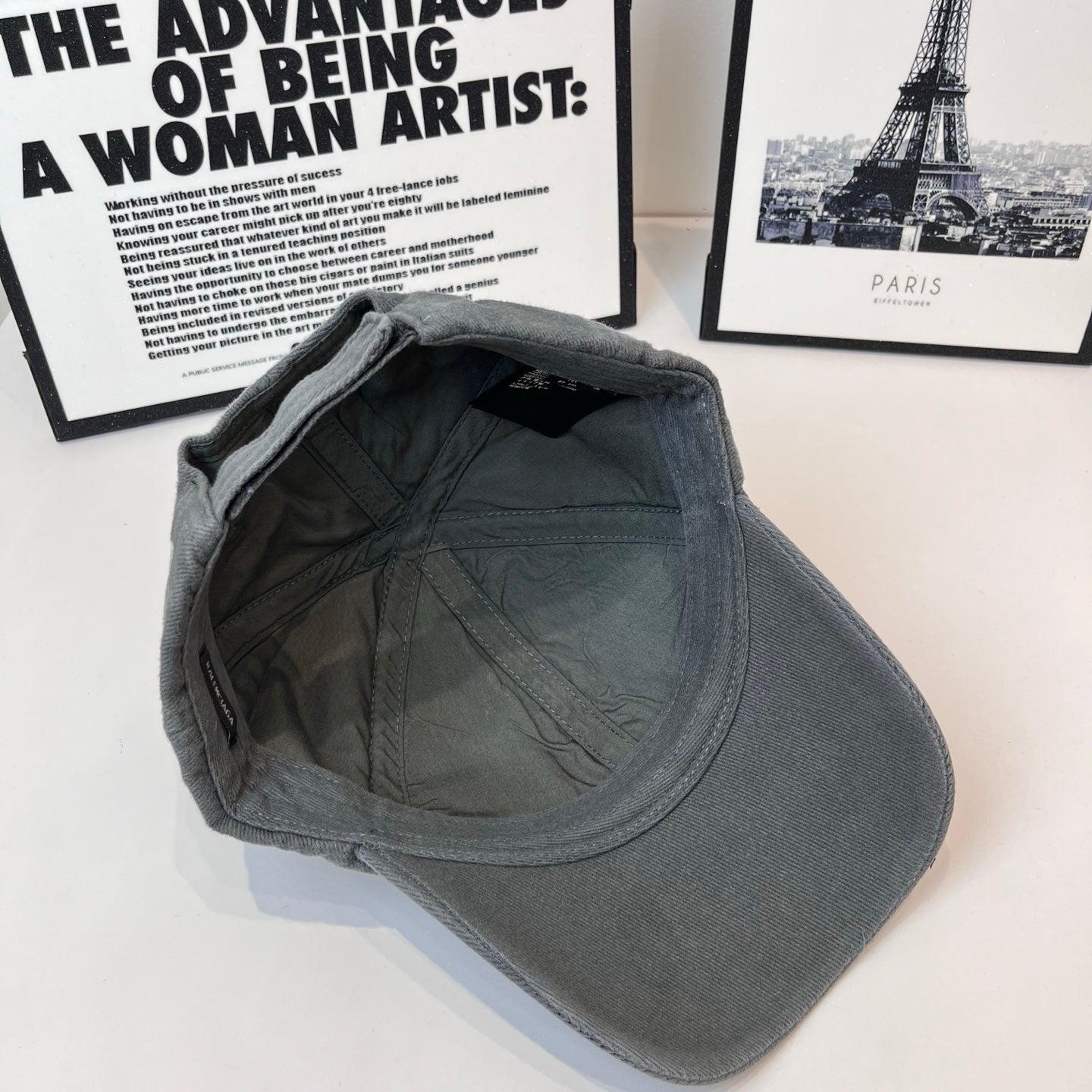 Balenciaga cap interior view with gray lining and curved brim seam