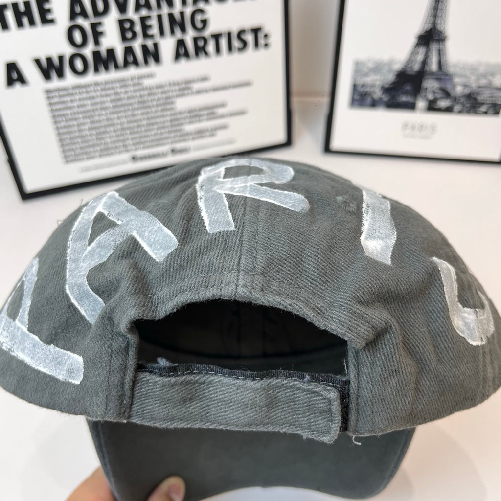 Dark gray baseball cap interior with stitched brim edge and crown lining