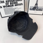 Baseball cap interior, dark lining with seams showing inner crown