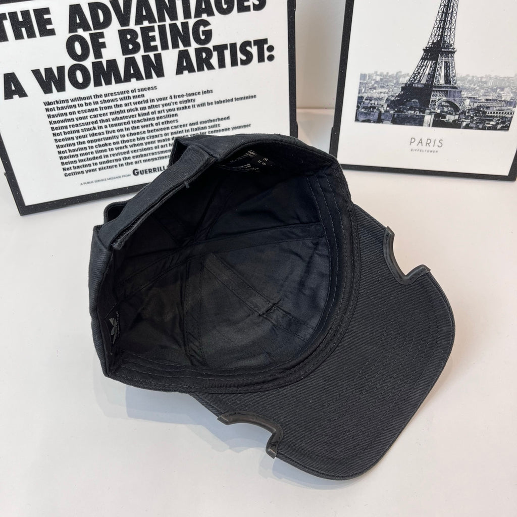 Black baseball cap interior back view with curved brim seam stitching