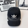 Black baseball cap with white trefoil and Balenciaga logo front