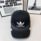 Black baseball cap with white trefoil and Balenciaga logo front