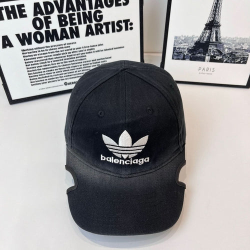 Black baseball cap with white trefoil and Balenciaga logo front