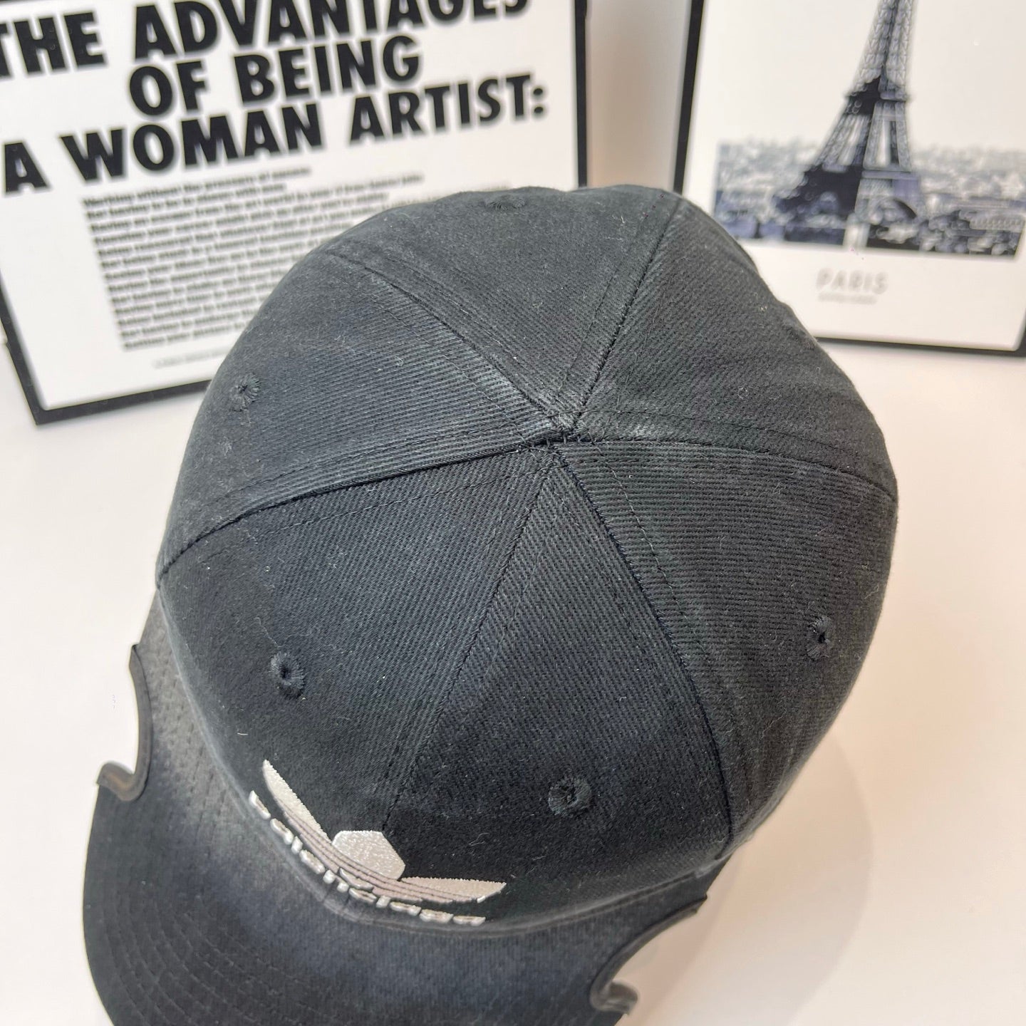 Balenciaga baseball cap, back view, dark fabric with small logo detail