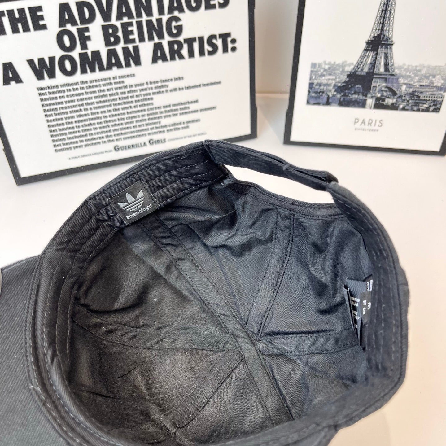 Black baseball cap interior with quilted lining and stitched seams