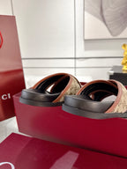 Gucci slide sandals side profile, black sole with beige GG canvas strap