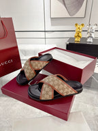 Gucci slide sandals, beige GG canvas with tan leather straps, black sole on box