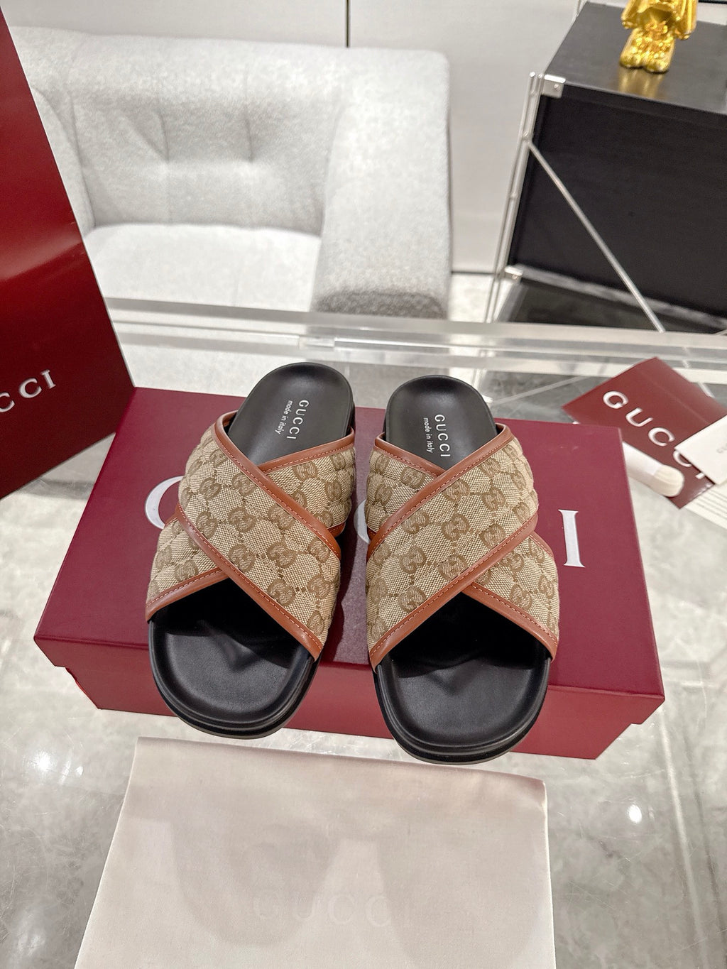 Gucci slide sandals: beige GG canvas with tan leather straps, black footbed