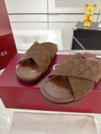 Gucci GG slide sandals, dark brown with open toe and crossover strap