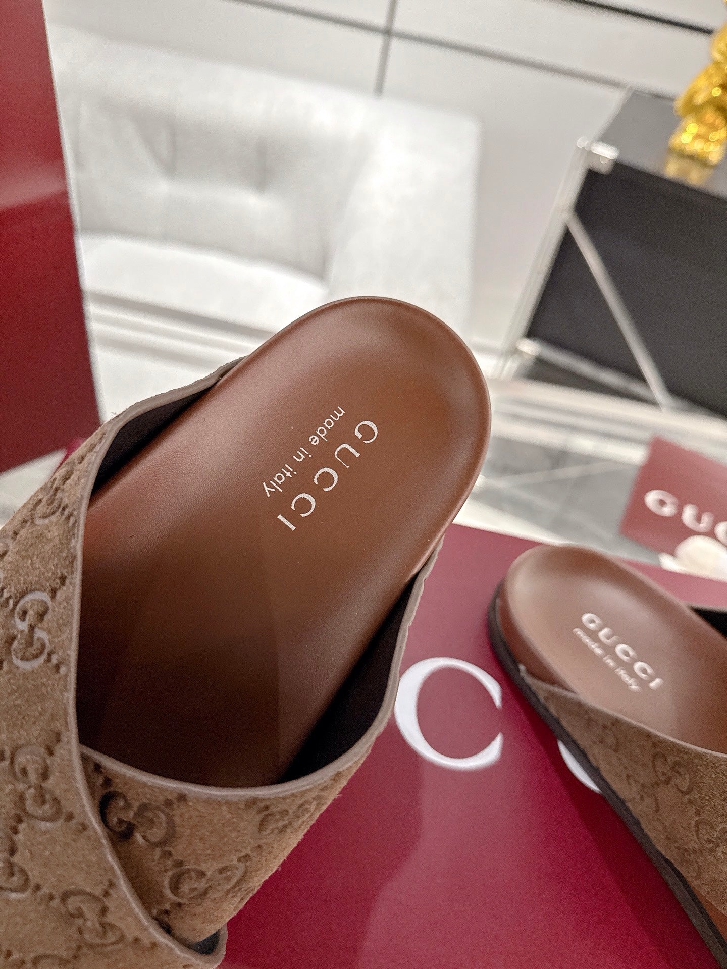 Gucci slide sandal footbed, dark brown leather with embossed Gucci text