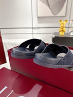 Gucci dark blue slide sandals with GG-pattern band and rounded rubber platform