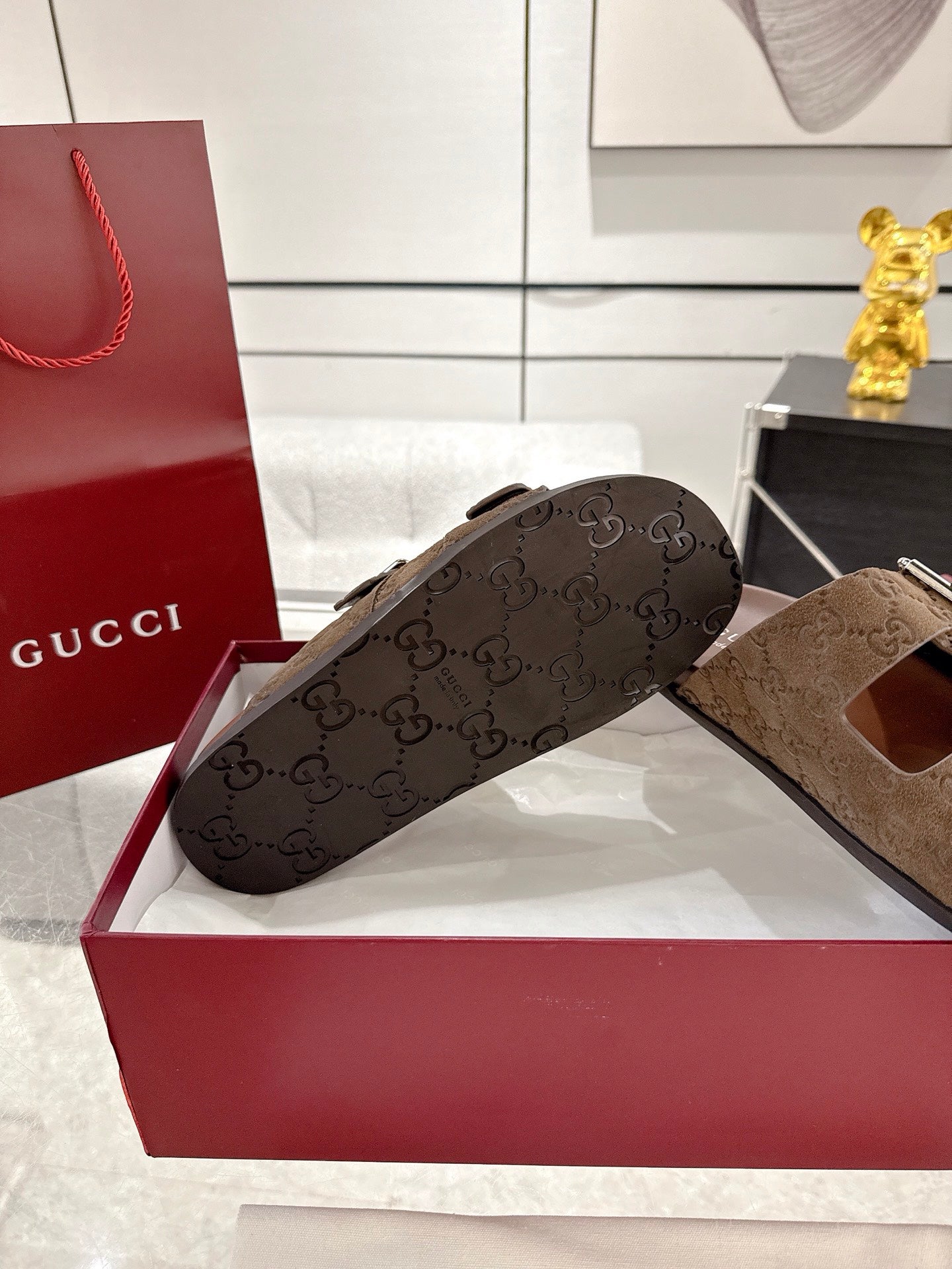 Black logo-print slide sandal with two straps and silver-tone square buckles