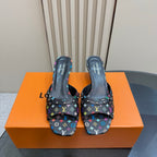 Louis Vuitton women's open-back mule heels, multicolor logo print on black upper