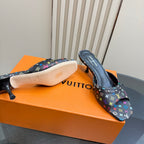 Louis Vuitton women's mule heels; view of insole and outsole underside on box