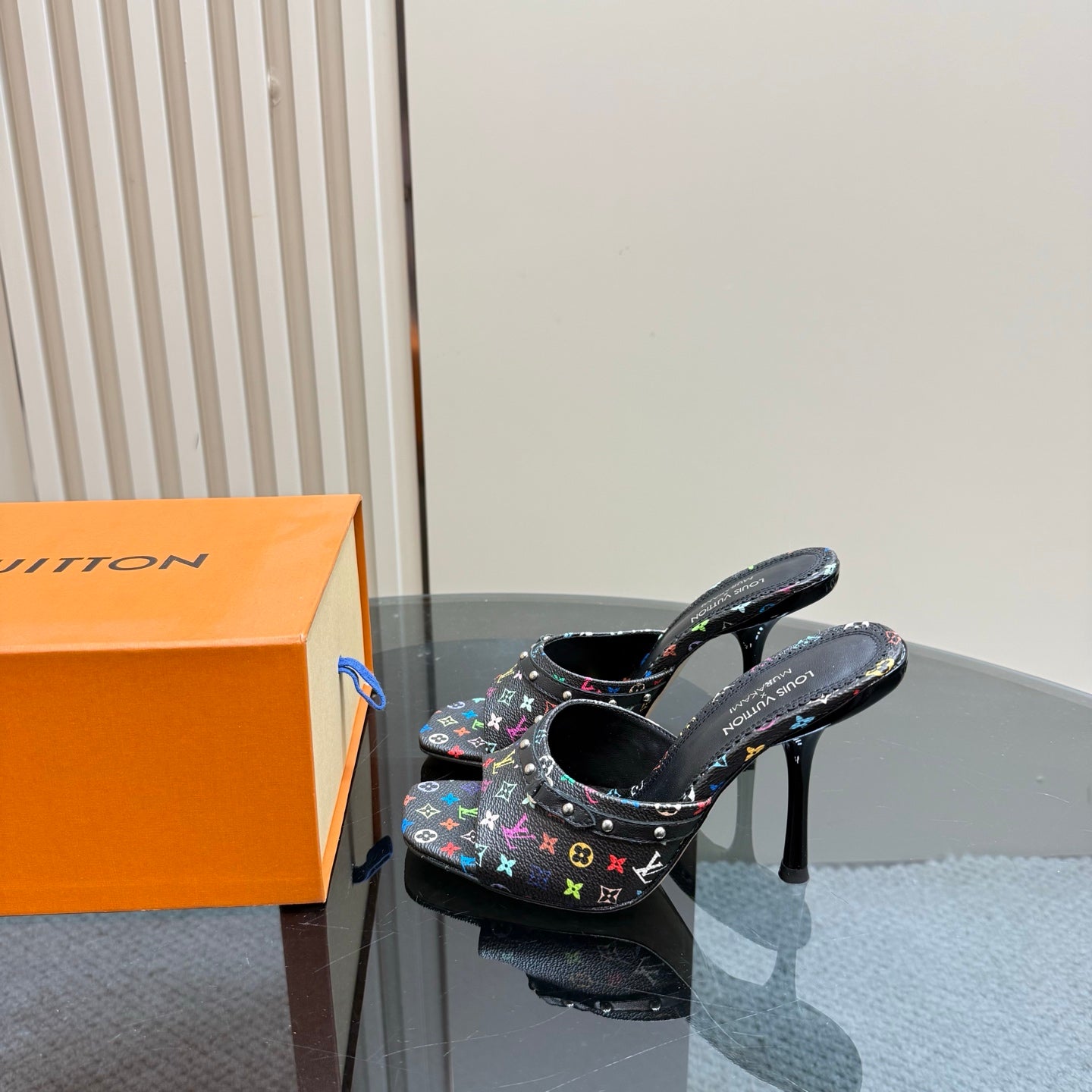 Louis Vuitton heeled mules with multicolor monogram strap, black fabric, open back