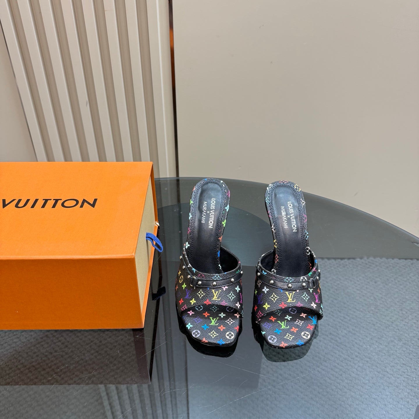 Pair of Louis Vuitton heeled mules in black with multicolor monogram strap detail, stiletto heel