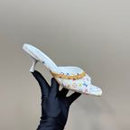 Louis Vuitton ladies heeled mule held up, white multicolor monogram print, gold-trim strap